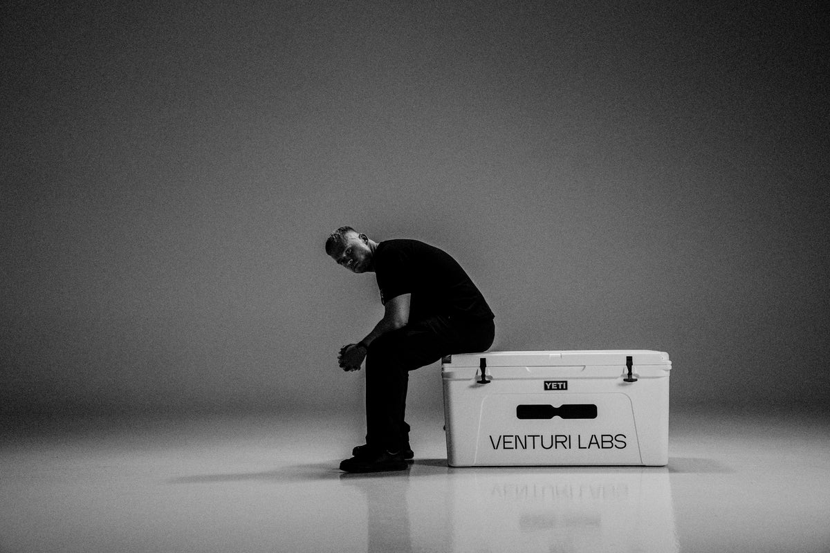 Jackson Read, founder of Venturi Labs, sitting on a Venturi Labs box